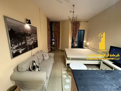 For monthly rent in Ajman - Studio apartment semi-detached kitchen, open view, fully furnished new with elegant furniture and a fully equipped kitchen