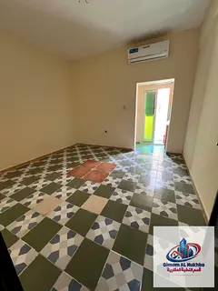 "Huge studio with balcony for rent in Al Nasserya Sharjah natural light split AC budget price f