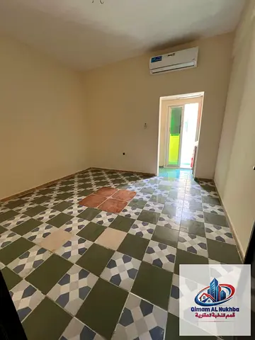"Huge studio with balcony for rent in Al Nasserya Sharjah natural light split AC budget price flexible payments and strategic location near services"