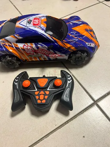 Remote control racing car with controller - working condition