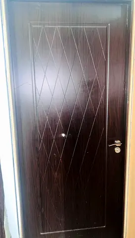 Solid Dark Wood Interior Door with Diamond Panel Design