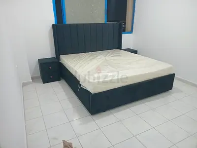 King-size upholstered bed frame with two matching nightstands - dark grey