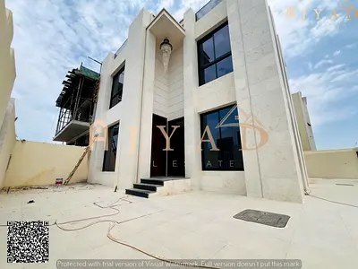 For sale: corner villa on 2 streets in Al Helio 1 Ajman, only 3 floors, 5 master bedrooms, majlis and 2 halls, main and prep kitchen, maid's room
