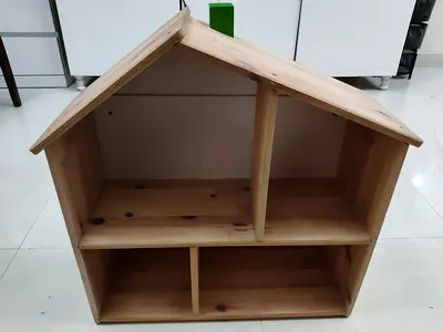 Wooden dollhouse and storage unit