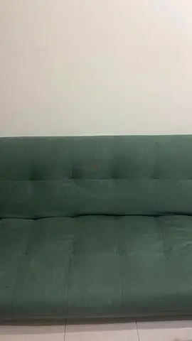 Green fabric sofa bed - good condition