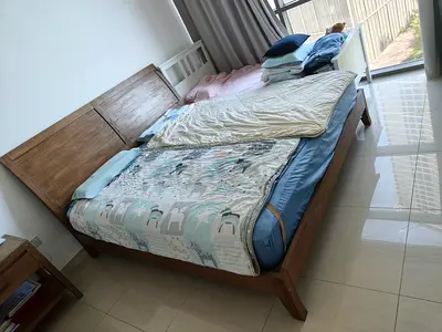Solid wood double bed frame with headboard - good condition