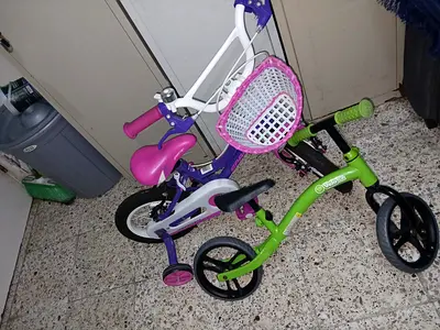 Two kids bikes with training wheels and balance bike - good condition