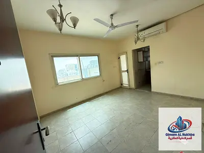Cheapest studio apartment in Al Butinah, Sharjah - Balcony with open view - Separate kitchen - Central gas - Annual rent - Free maintenance - Spacious
