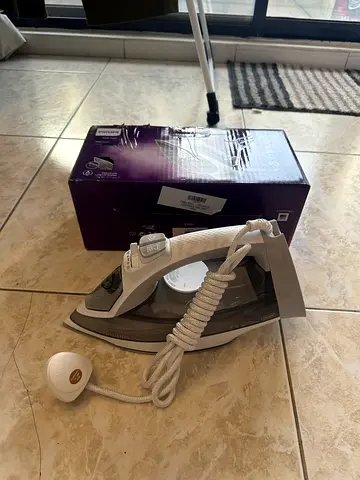 Used Steam Iron in Good Working Condition