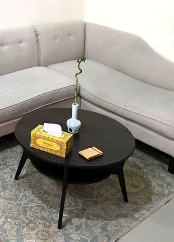 Round Dark Wood Coffee Table with Lower Shelf