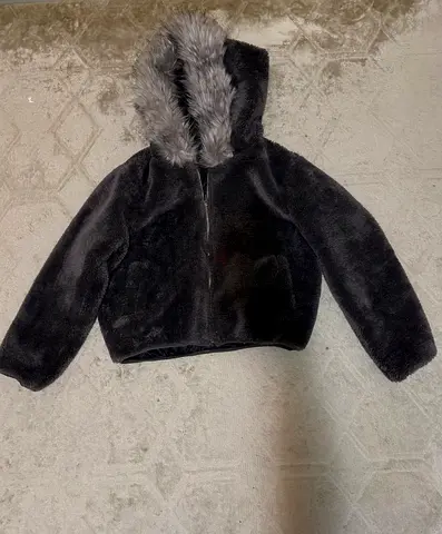 Black cropped faux-fur hooded jacket with grey trim, size M