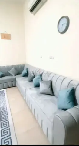 Large L-shaped Light Grey Fabric Sofa with Cushions