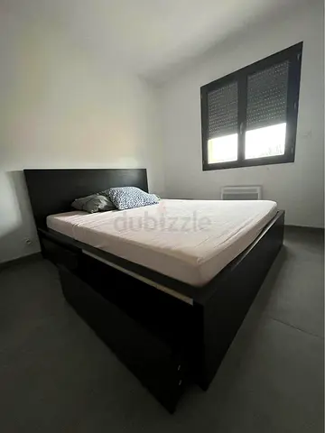 Ikea King Black Malm bed frame with Ikea King mattress