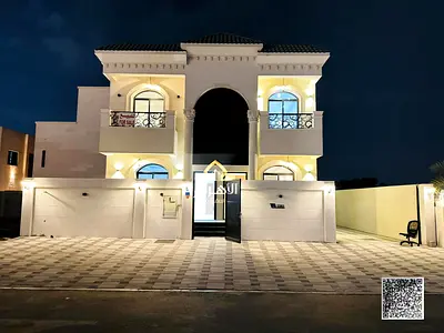 Luxury villa for sale in Al Helio, Ajman. Modern design and ideal spaces for families. Price includes registration fees.