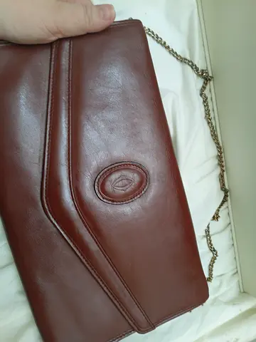 Cartier sling clutch bag