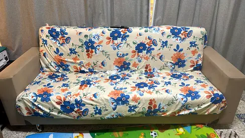 3-Seater Sofa Bed in Beige with storage underneath and in good condition without damages