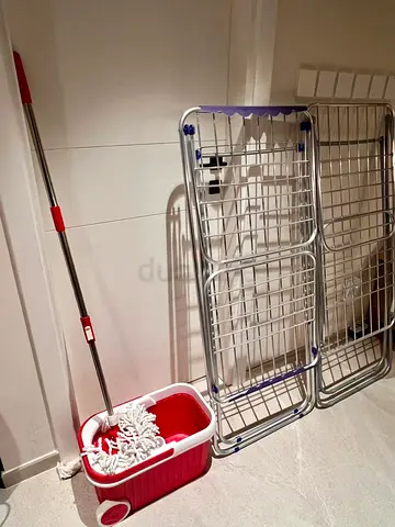 Spin mop with bucket and two foldable drying racks - good condition