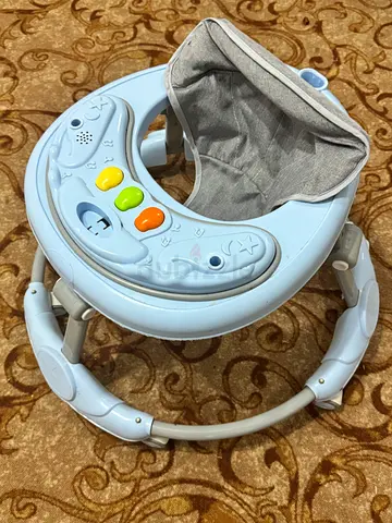 Baby activity jumper with music and seat - lightly used
