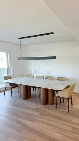 Contemporary Double Pedestal Dining Table with Soft Curved Silhouette