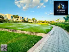 A villa in Al Zorah compound with a very spacious area and garden in one of the most prestigious are