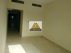 Studio in Corniche, Al Karama Street. Large space, semi-separate kitchen, clean building, private pa