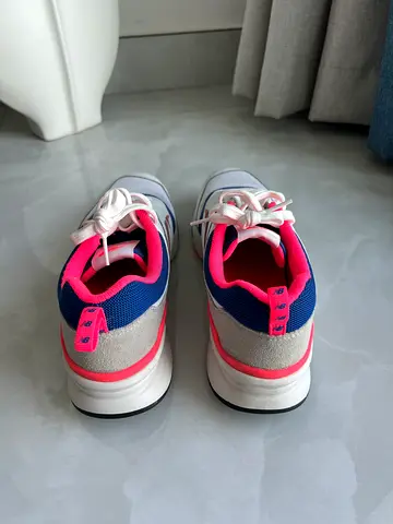 Lightly used women’s white sneakers with pink  navy accents, EU 42