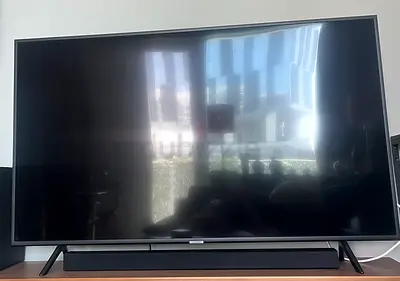 55-inch LED Smart TV with Soundbar - Good Condition