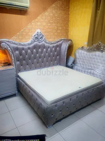 King-size tufted velvet bed frame with mattress — ornate silver design