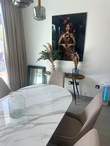 Modern marble-effect dining table with 6 upholstered chairs and a matching coffee table. 3months old