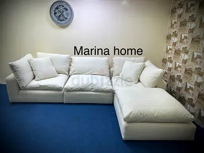 As perfect condition marina home luscious sofa with footstool