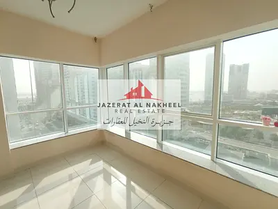 Two-bedroom apartment with a living room for rent on Al Taawun Street