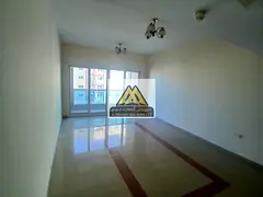 The apartment features a balcony, free parking, built-in wardrobes, and a laundry room in a prime lo