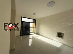 Luxury 2BR apartment for annual rent in Al Alia, Ajman. Brand-new building, first tenant, 2 master r