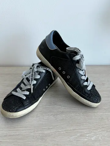 Golden Goose black sneakers