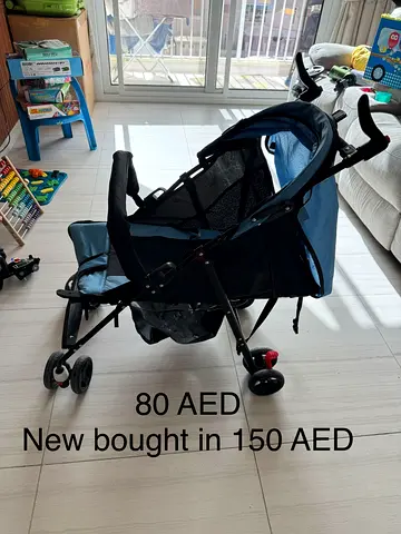 Lightweight Compact Baby Stroller - Good Condition (80 AED)