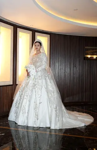 Hand made White embroidered long-sleeve bridal gown with cathedral train and veil