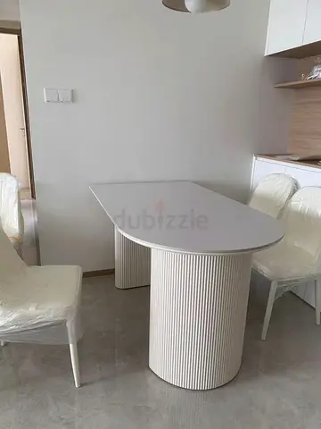 Custom Made Sculptural Dining Table with Cylindrical Bases and Modern Finish