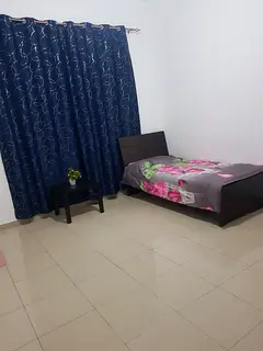 Master bedroom with attached bathroom for KERALITE executive bachelors
