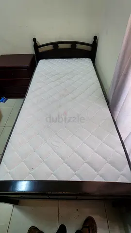 Single wooden bed frame with mattress and bedside drawer - good condition