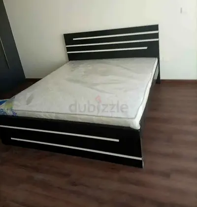 Brand New Queen-sized wooden bed frame with mattress - black and white design