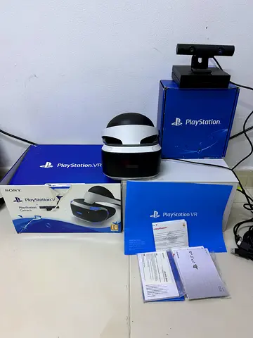 Sony PlayStation VR headset with camera and original boxes - good condition