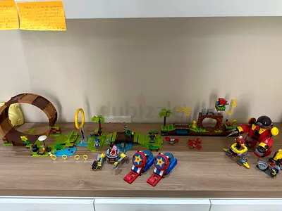 Large collection of LEGO-style SONIC action figure playsets with vehicles and building pieces