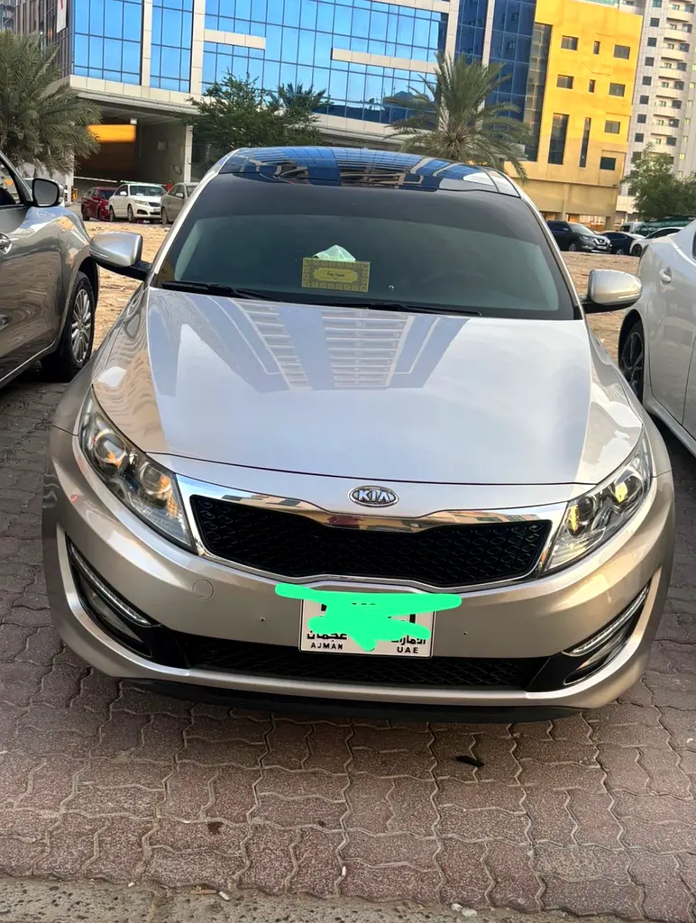 Kia K5 2011 — photo 1 of 10
