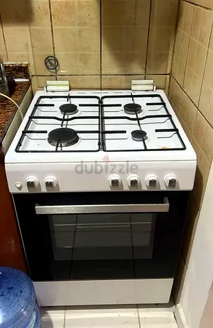 Whirlpool 4-Burner Gas Cooker with Oven - Compact Kitchen Range