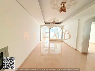 Annual rent in Al Mowaihat 3: Spacious 3BR apartment with balcony, central AC, wardrobes & 1 free month. Payment in 4 or 6 cheques.
