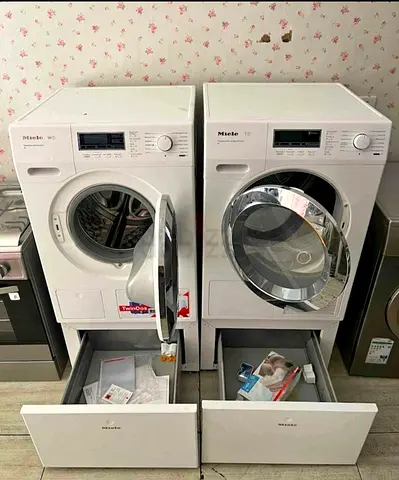 Miele latest model twin dos 9 kg washer and 9 kg dryer separate set freestanding tower type