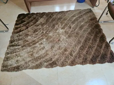 Brown shaggy rectangular rug - good condition