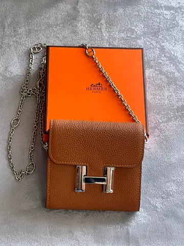 brown Hermès wallet