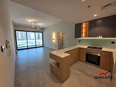 Spacious 2BR | Prime Location | Balcony &amp; City View | DLRC