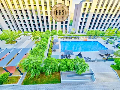 Pool View Modern 1bhk + Balcony in Tiraz Al jada Community